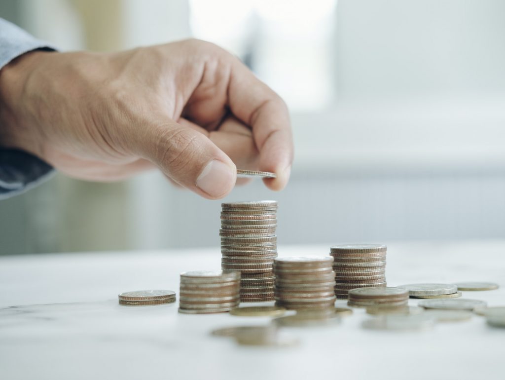 Businessman saving money concept.