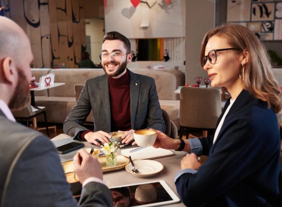 Discussing strategy in restaurant